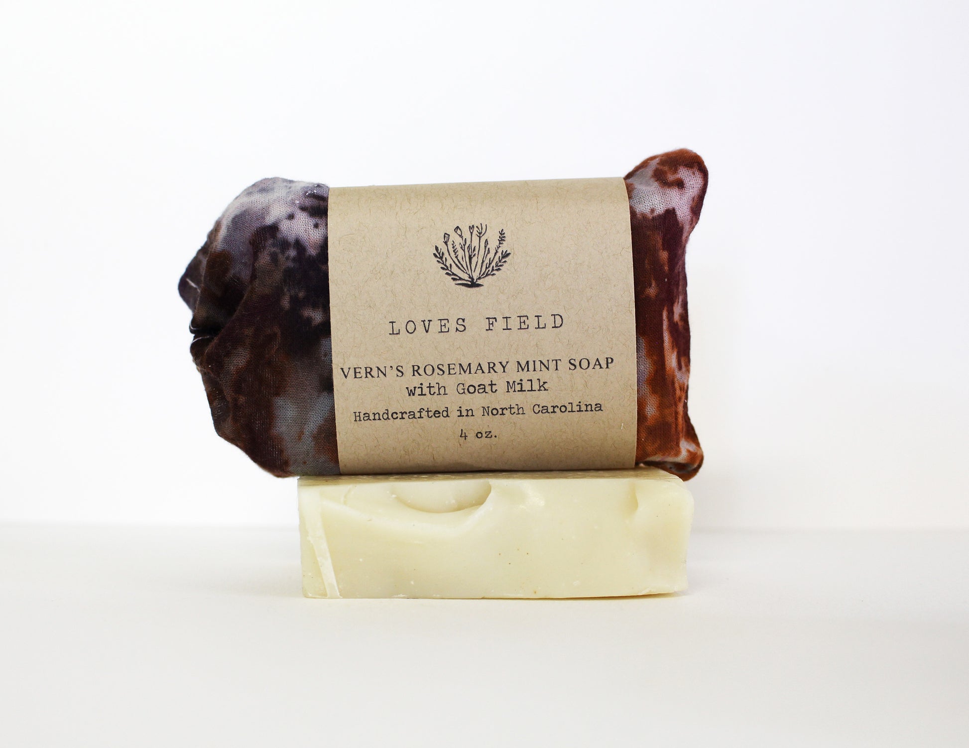 Vern's Rosemary Peppermint Goat Milk Soap 5oz front view, palm-free, handcrafted in North Carolina with rosemary and peppermint essential oils